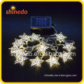 12 LED Christmas warm white flashing or steady two modes solar star shaped string light for decoration